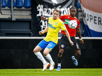 NEC player Sontje Hansen and RKC player Julian Lelieveld during the match RKC vs. NEC (friendly) at the Mandemakers Stadium for the Dutch Er...