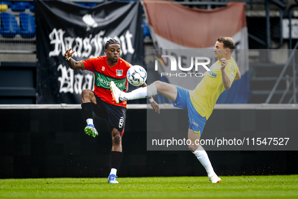 NEC player Sontje Hansen and RKC player Julian Lelieveld during the match RKC vs. NEC (friendly) at the Mandemakers Stadium for the Dutch Er...