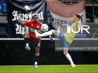 NEC player Sontje Hansen and RKC player Julian Lelieveld during the match RKC vs. NEC (friendly) at the Mandemakers Stadium for the Dutch Er...