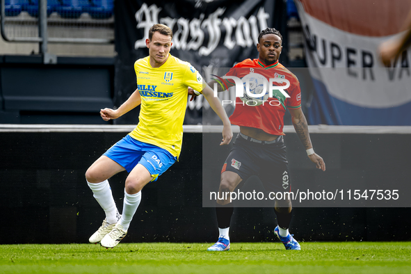 NEC player Sontje Hansen and RKC player Julian Lelieveld during the match RKC vs. NEC (friendly) at the Mandemakers Stadium for the Dutch Er...