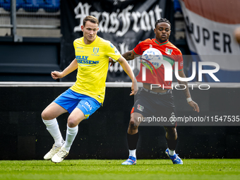 NEC player Sontje Hansen and RKC player Julian Lelieveld during the match RKC vs. NEC (friendly) at the Mandemakers Stadium for the Dutch Er...