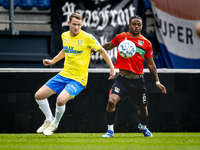 NEC player Sontje Hansen and RKC player Julian Lelieveld during the match RKC vs. NEC (friendly) at the Mandemakers Stadium for the Dutch Er...