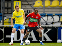 RKC player Julian Lelieveld and NEC player Sontje Hansen during the match RKC vs. NEC (friendly) at the Mandemakers Stadium for the Dutch Er...