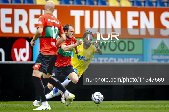 NEC player Thomas Ouwejan and RKC player Denilho Cleonise during the match RKC vs. NEC (friendly) at the Mandemakers Stadium for the Dutch E...