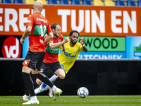 NEC player Thomas Ouwejan and RKC player Denilho Cleonise during the match RKC vs. NEC (friendly) at the Mandemakers Stadium for the Dutch E...