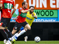 NEC player Thomas Ouwejan and RKC player Denilho Cleonise during the match RKC vs. NEC (friendly) at the Mandemakers Stadium for the Dutch E...