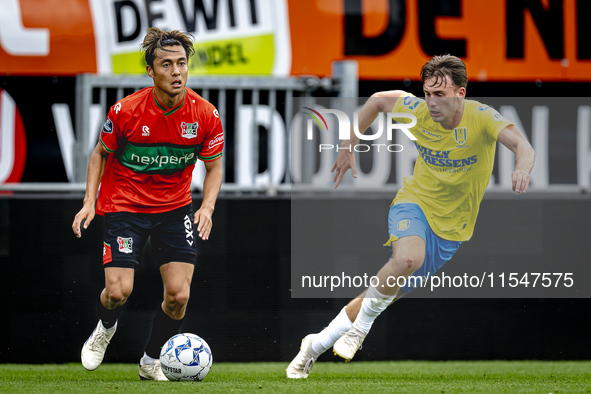 NEC player Kosai Sano and RKC player Patrick Vroegh during the match RKC vs. NEC (friendly) at the Mandemakers Stadium for the Dutch Eredivi...