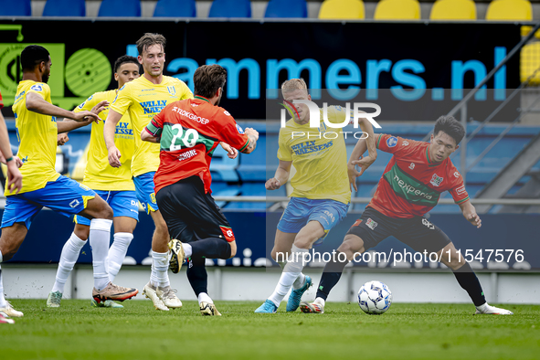 RKC player Dario van de Buijs and NEC player Kento Shiogai during the match RKC vs. NEC (friendly) at the Mandemakers Stadium for the Dutch...