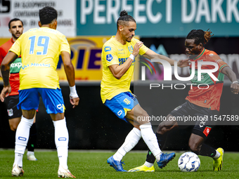 RKC player Alexander Jakobsen and NEC player Brayann Pereira during the match RKC vs. NEC (friendly) at the Mandemakers Stadium for the Dutc...