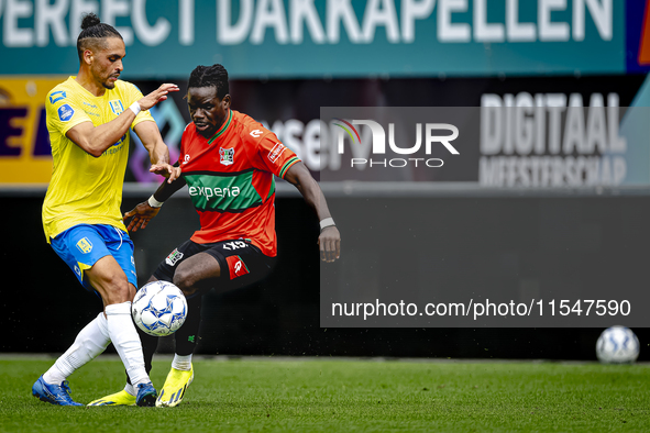 RKC player Alexander Jakobsen and NEC player Brayann Pereira during the match RKC vs. NEC (friendly) at the Mandemakers Stadium for the Dutc...