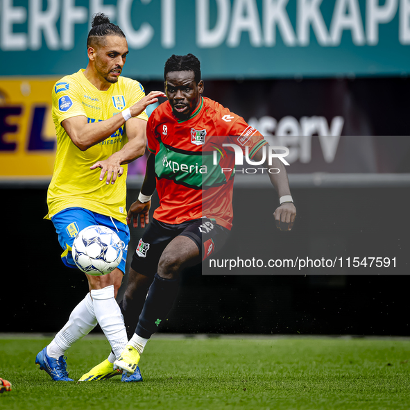 RKC player Alexander Jakobsen and NEC player Brayann Pereira during the match RKC vs. NEC (friendly) at the Mandemakers Stadium for the Dutc...