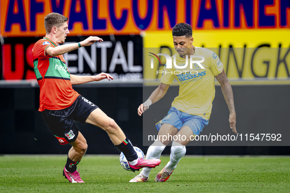 NEC player Mees Hoedemakers and RKC player Richonell Margaret during the match RKC vs. NEC (friendly) at the Mandemakers Stadium for the Dut...