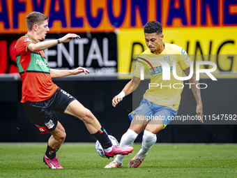 NEC player Mees Hoedemakers and RKC player Richonell Margaret during the match RKC vs. NEC (friendly) at the Mandemakers Stadium for the Dut...