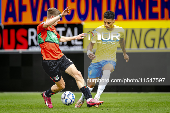 NEC player Mees Hoedemakers and RKC player Richonell Margaret during the match RKC vs. NEC (friendly) at the Mandemakers Stadium for the Dut...