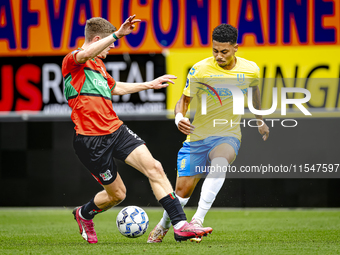 NEC player Mees Hoedemakers and RKC player Richonell Margaret during the match RKC vs. NEC (friendly) at the Mandemakers Stadium for the Dut...