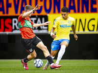 NEC player Mees Hoedemakers and RKC player Richonell Margaret during the match RKC vs. NEC (friendly) at the Mandemakers Stadium for the Dut...