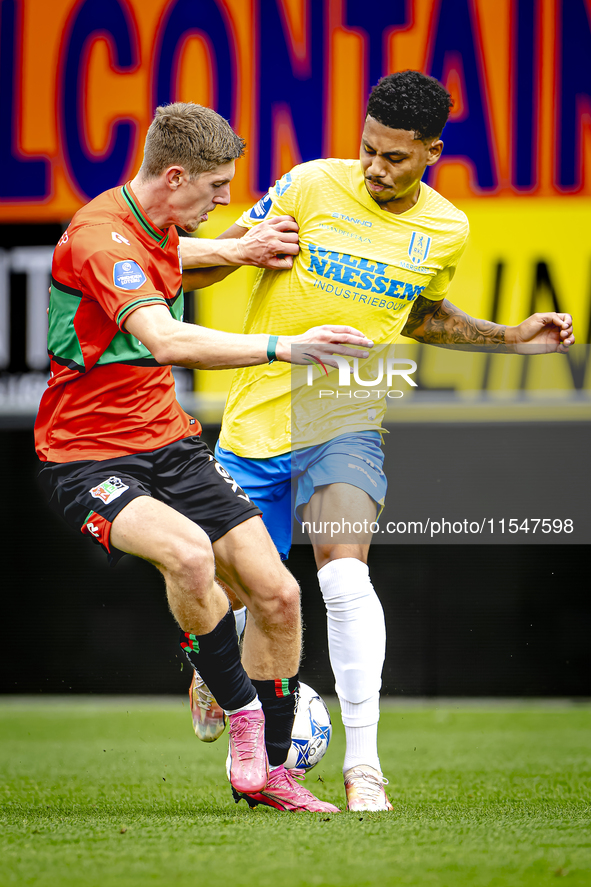 NEC player Mees Hoedemakers and RKC player Richonell Margaret during the match RKC vs. NEC (friendly) at the Mandemakers Stadium for the Dut...