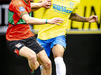 NEC player Mees Hoedemakers and RKC player Richonell Margaret during the match RKC vs. NEC (friendly) at the Mandemakers Stadium for the Dut...