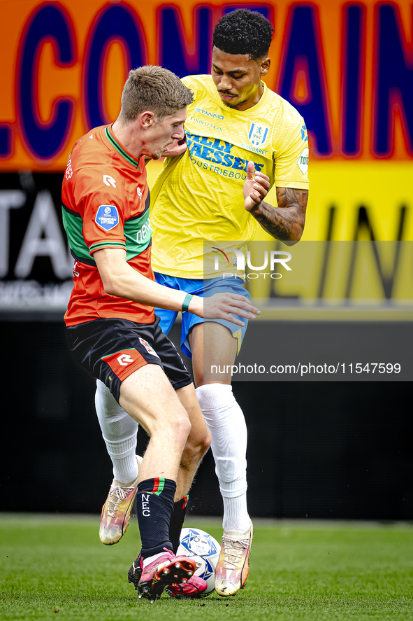 NEC player Mees Hoedemakers and RKC player Richonell Margaret during the match RKC vs. NEC (friendly) at the Mandemakers Stadium for the Dut...