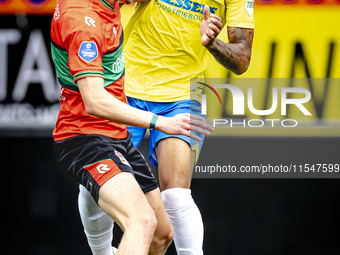 NEC player Mees Hoedemakers and RKC player Richonell Margaret during the match RKC vs. NEC (friendly) at the Mandemakers Stadium for the Dut...