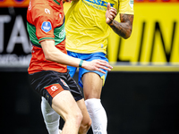 NEC player Mees Hoedemakers and RKC player Richonell Margaret during the match RKC vs. NEC (friendly) at the Mandemakers Stadium for the Dut...