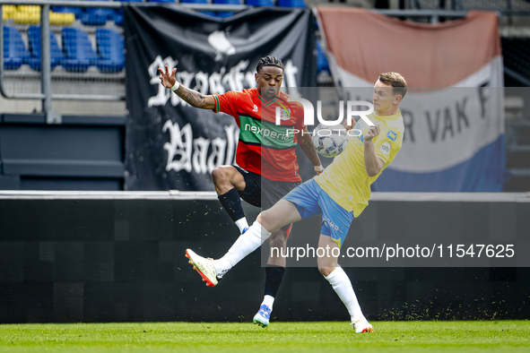 NEC player Sontje Hansen and RKC player Julian Lelieveld during the match RKC vs. NEC (friendly) at the Mandemakers Stadium for the Dutch Er...