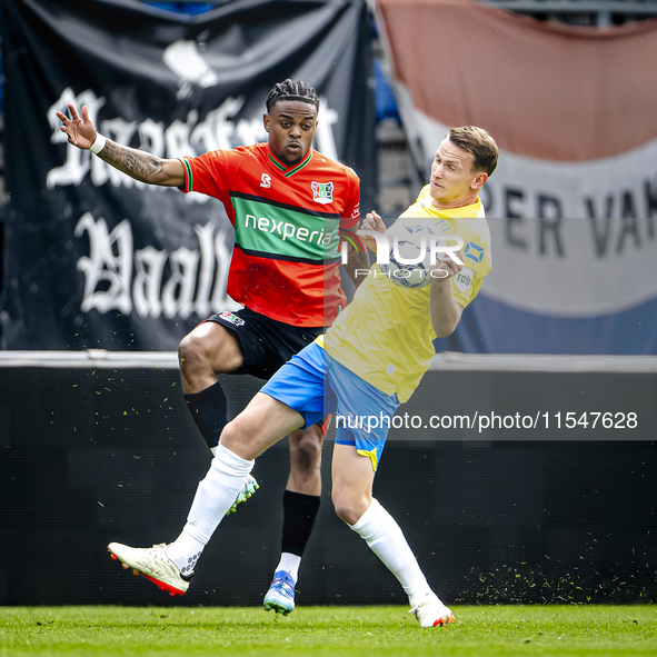 NEC player Sontje Hansen and RKC player Julian Lelieveld during the match RKC vs. NEC (friendly) at the Mandemakers Stadium for the Dutch Er...