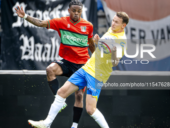 NEC player Sontje Hansen and RKC player Julian Lelieveld during the match RKC vs. NEC (friendly) at the Mandemakers Stadium for the Dutch Er...