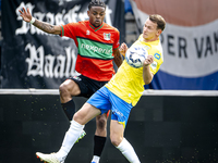 NEC player Sontje Hansen and RKC player Julian Lelieveld during the match RKC vs. NEC (friendly) at the Mandemakers Stadium for the Dutch Er...