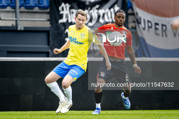 NEC player Sontje Hansen and RKC player Julian Lelieveld during the match RKC vs. NEC (friendly) at the Mandemakers Stadium for the Dutch Er...