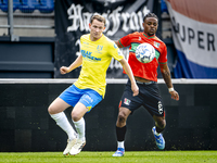 NEC player Sontje Hansen and RKC player Julian Lelieveld during the match RKC vs. NEC (friendly) at the Mandemakers Stadium for the Dutch Er...