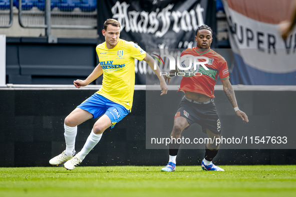 NEC player Sontje Hansen and RKC player Julian Lelieveld during the match RKC vs. NEC (friendly) at the Mandemakers Stadium for the Dutch Er...