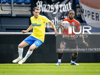 NEC player Sontje Hansen and RKC player Julian Lelieveld during the match RKC vs. NEC (friendly) at the Mandemakers Stadium for the Dutch Er...