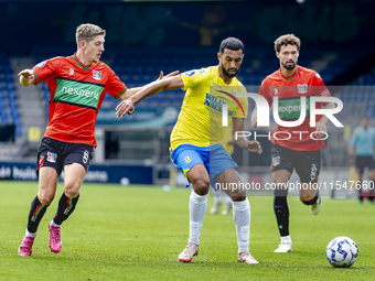 NEC player Mees Hoedemakers, RKC player Yassin Oukili, and NEC player Philippe Sandler during the match RKC vs. NEC (friendly) at the Mandem...