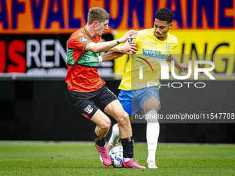 NEC player Mees Hoedemakers and RKC player Richonell Margaret during the match RKC vs. NEC (friendly) at the Mandemakers Stadium for the Dut...