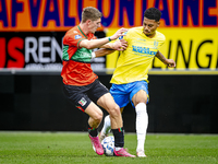 NEC player Mees Hoedemakers and RKC player Richonell Margaret during the match RKC vs. NEC (friendly) at the Mandemakers Stadium for the Dut...