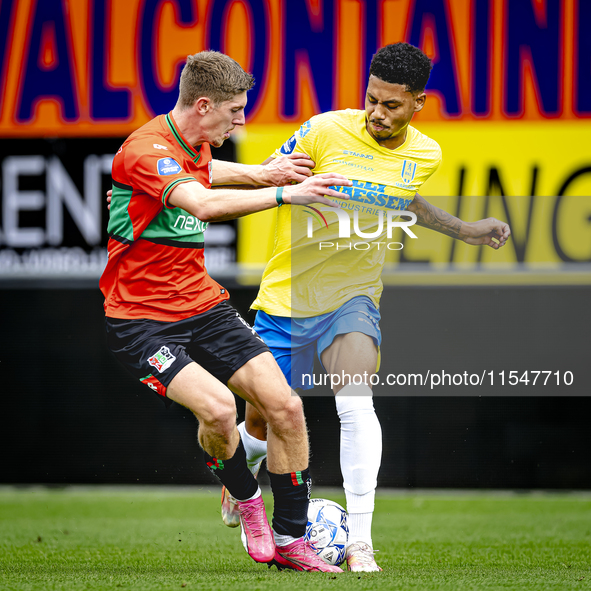 NEC player Mees Hoedemakers and RKC player Richonell Margaret during the match RKC vs. NEC (friendly) at the Mandemakers Stadium for the Dut...