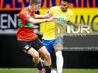 NEC player Mees Hoedemakers and RKC player Richonell Margaret during the match RKC vs. NEC (friendly) at the Mandemakers Stadium for the Dut...