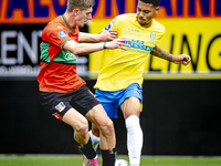 NEC player Mees Hoedemakers and RKC player Richonell Margaret during the match RKC vs. NEC (friendly) at the Mandemakers Stadium for the Dut...