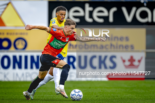 NEC player Luc Nieuwenhuijs and RKC player Daouda Weidmann during the match RKC vs. NEC (friendly) at the Mandemakers Stadium for the Dutch...