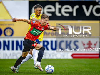 NEC player Luc Nieuwenhuijs and RKC player Daouda Weidmann during the match RKC vs. NEC (friendly) at the Mandemakers Stadium for the Dutch...