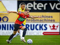 NEC player Luc Nieuwenhuijs and RKC player Daouda Weidmann during the match RKC vs. NEC (friendly) at the Mandemakers Stadium for the Dutch...