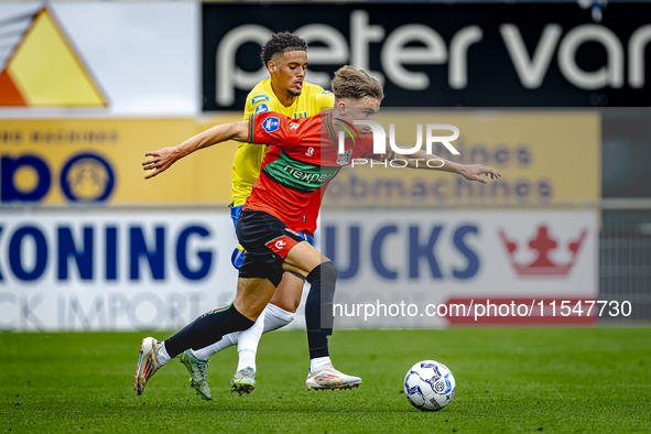 NEC player Luc Nieuwenhuijs and RKC player Daouda Weidmann during the match RKC vs. NEC (friendly) at the Mandemakers Stadium for the Dutch...