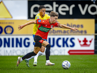 NEC player Luc Nieuwenhuijs and RKC player Daouda Weidmann during the match RKC vs. NEC (friendly) at the Mandemakers Stadium for the Dutch...