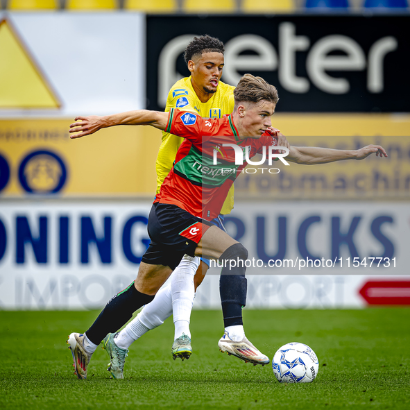 NEC player Luc Nieuwenhuijs and RKC player Daouda Weidmann during the match RKC vs. NEC (friendly) at the Mandemakers Stadium for the Dutch...