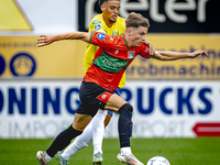 NEC player Luc Nieuwenhuijs and RKC player Daouda Weidmann during the match RKC vs. NEC (friendly) at the Mandemakers Stadium for the Dutch...