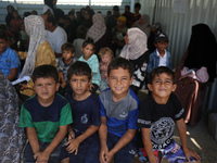 Palestinian children receive polio vaccinations at the UK-MED field hospital in Khan Younis in the southern Gaza Strip, on September 5, 2024...