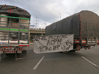 A sign in some tractor-trailers says "no to the increase of the ACPM" in Bogota, Colombia, on September 4, 2024. Truckers mainly protest aga...