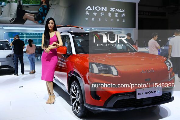 A model displays a new car at the 23rd Autumn International Auto Show in Qingdao, China, on September 5, 2024. 