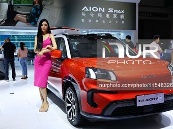 A model displays a new car at the 23rd Autumn International Auto Show in Qingdao, China, on September 5, 2024. (